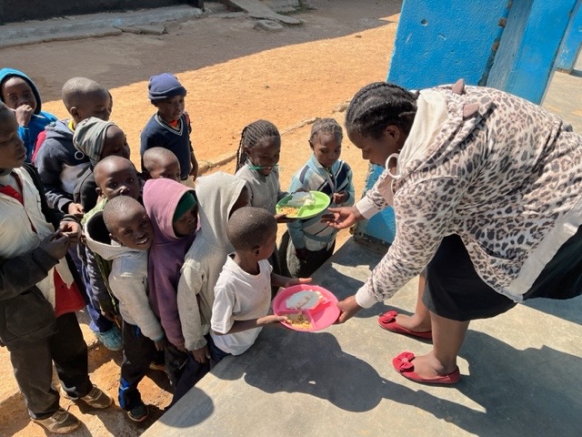 Children being given their lunch